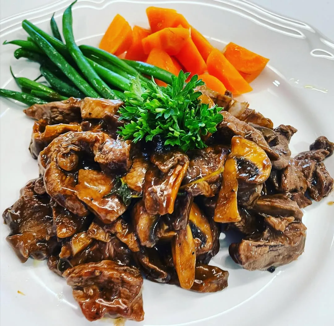 Beef and mushrooms finished with parsley